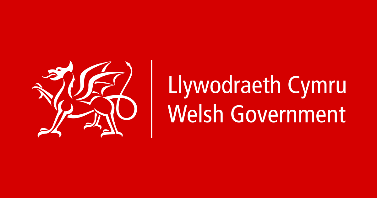 The Welsh Government logo – a white dragon illustration on a red background, with white text underneath reading ‘Llywodraeth Cymru Welsh Government’.